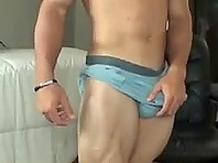 Hot Hunk Showing His Muscles and Masturbating