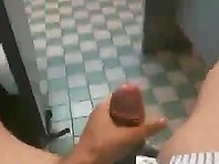 Amateur Clip of a Dude Jerking off in a Cubicle