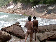 A cute queer gets unforgettably fucked by a black stud on a beach