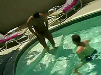 Two handsome dudes make out in a pool and bang doogy style