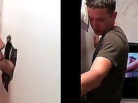 Horny queer sucks and rubs a hard gloryhole prick